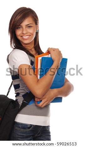 Attractive young student going back to school college smiling and holding books.