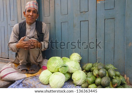 KATHMANDU, NEPAL - DECEMBER 29 : Local people on the street sell local vegetable in Kathmandu,Nepal on March 23, 2013.Most of the Nepalese depend upon Agriculture for there livelihood.