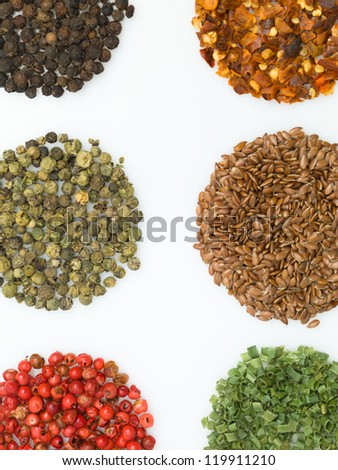 round spices on white background macro close-up detail colorful