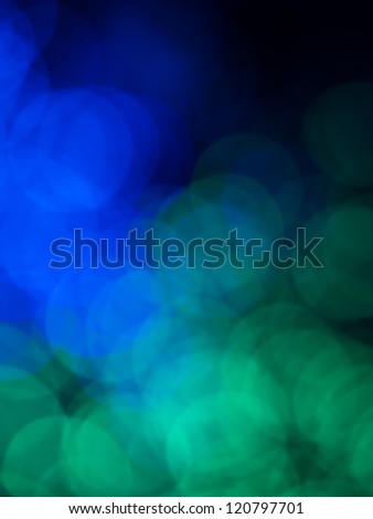 wallpaper with abstract round shaped transparent green and blue lights