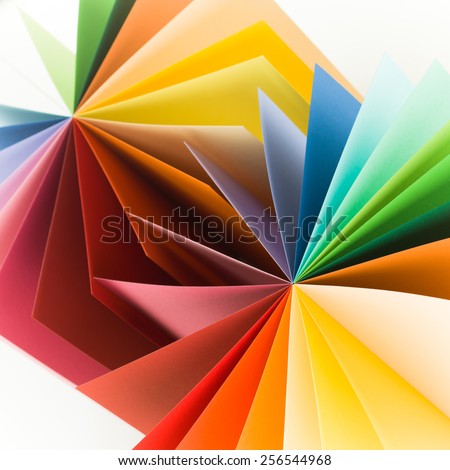 abstract image of colorful paper displayed in round fan shape