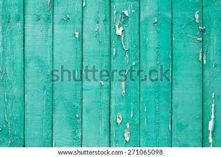 Old wood painted with green paint background