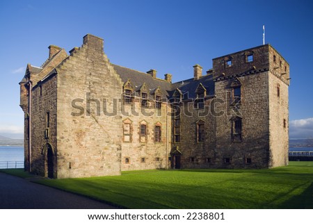 Newark Castle, lit by a low sun, Port Glasgow, Scotland