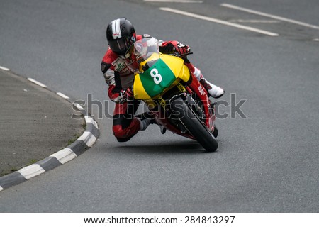 ISLE OF MAN, UK - MAY 30: A rider undertakes their first official practice laps of the annual TT (Tourist Trophy) race on 30 May 2015 in the Isle of Man (Public Event)