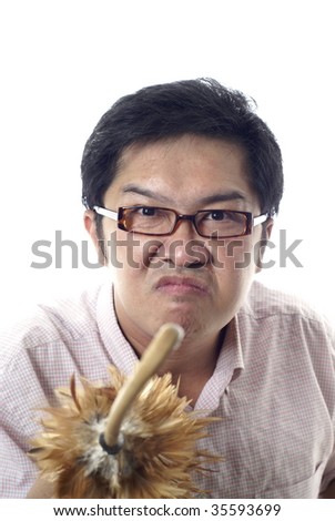 Angry teacher with feather duster cane on white background