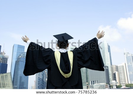 Happy male asian graduate success with city background