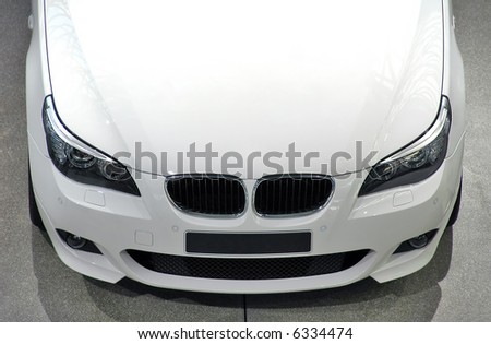 White luxury car - front/top view
