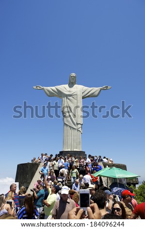 RIO DE JANEIRO, BRAZIL - OCTOBER 20, 2013: Tourists crowd the viewing platform at the statue of Christ the Redeemer, at the peak of Corcovado Mountain.