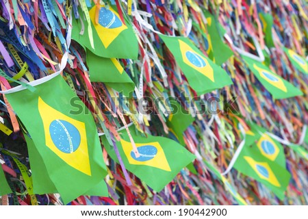Brazilian flags flying on a wall of wish ribbons at the famous Church Igrega Nosso Senhor do Bonfim Salvador Bahia Brazil