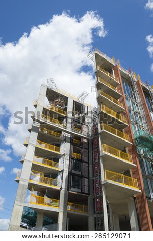 LONDON, UK - JUNE 06, 2015: Modern hi-rise towers under construction in the vicinity of King\'s Cross at Regent\'s Canal.