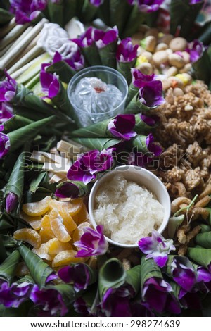 Flowers and fruits offerings at Buddhist Thai temple