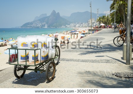 RIO DE JANEIRO, BRAZIL - FEBRUARY 22, 2015: Cart delivering bags of fresh ice to beach stalls stands parked on the the Ipanema Beach boardwalk.