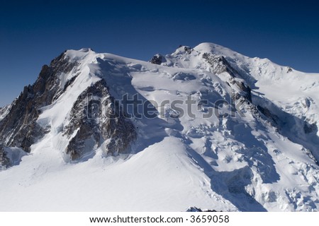 View of Mont Blanc mountain range from Aiguille Du Midi in Chamonix - landscape orientation