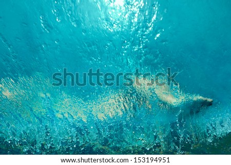Abstract human body silhouette among the water splashes