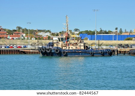Tug Boat Docked in Port