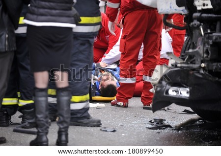 SERBIA, BELGRADE - MART 10, 2013: Injured driver in car accident with participation of trucks and trams at the intersection on New Belgrade