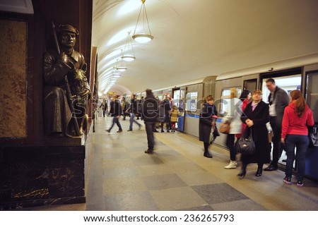MOSCOW, RUSSIA - MARCH 23, 2014: Interior of the metro station Ploshad Revolucii (Square of Revolution) in Moscow, Russia. Metro station is a beautiful monument of the Soviet era.