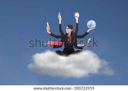 Beautiful asian business woman looking confident with six arms sitting on a cloud