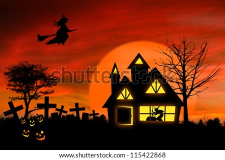 Haunted mansion with Jack O Lantern and spooky graveyard in front of it