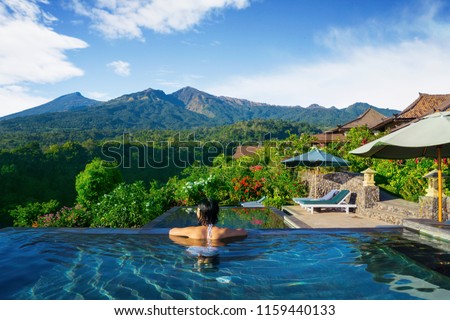 Similar – Image, Stock Photo Anonymous woman on mountain enjoying nature
