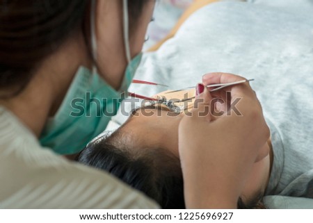Similar – Image, Stock Photo Macro unknown hand giving terminal to visitor for mobile phone payment indoor. Client hand paying bill with smartphone in blurred background. Cropped shot hands making contactless transaction inside.
