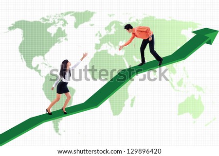 Businessman is helping businesswoman to achieve higher profit on world map background