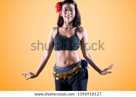 Similar – Image, Stock Photo Graceful Arab woman doing Anjaneyasana pose on pier