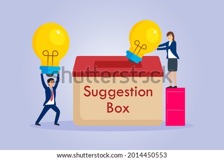 Suggestion vector concept. Business people putting light bulb into a suggestion box Foto d'archivio © 
