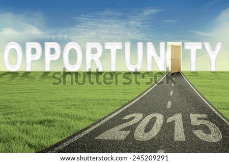 Road with number 2015 and an opportunity door, symbolizing the way to get an opportunity in the future