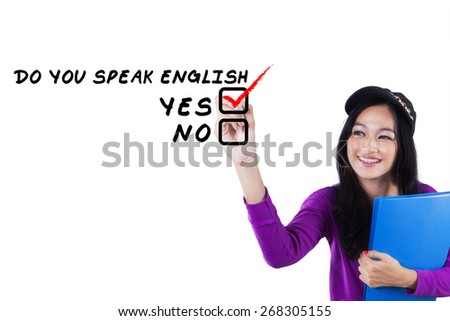 Portrait of attractive female student write Do You Speak English?