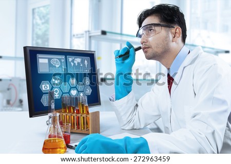 Portrait of male scientist thinking an idea to find a discovery while working in the laboratory