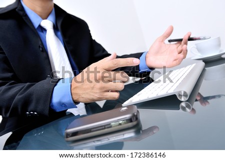 young businessman working on his desktop