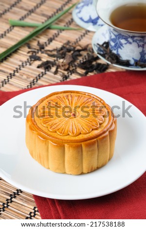 Mooncake on bamboo mat, Chinese Mid-autumn festival dessert