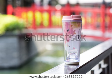 BANGKOK, THAILAND - APRIL 02, 2015: Limited Edition of sakura tumbler with Starbucks logo. Starbucks is the world\'s largest coffee house with over 20,000 stores in 61 countries.