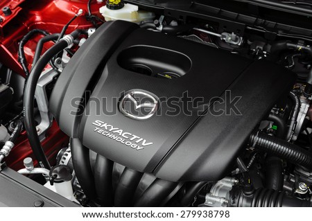 BANGKOK, THAILAND - MAY 20, 2015: Engine of All New Mazda 2 with SKYACTIV Technology. SKYACTIV is a brand name of technologies developed by Mazda which increase fuel efficiency and engine output.