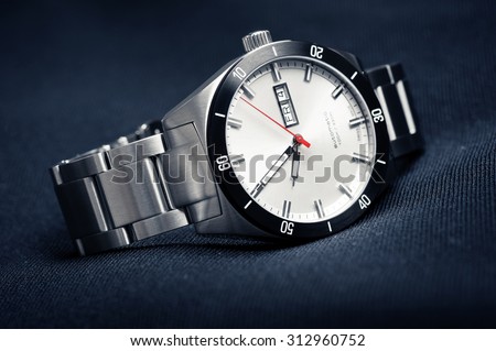 closeup automatic men watch with stainless steel wrist