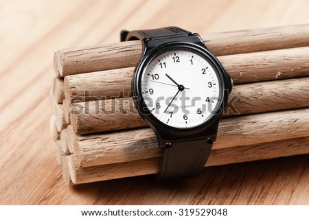 old black plastic fashion wristwatch with scratch