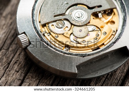 closeup the movement of old swiss made automatic watch