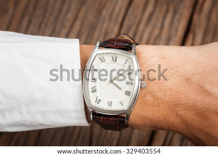 vintage style of luxury men watch on wrist