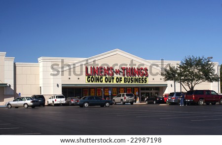 TYLER, TX – NOV 7: A “Going Out of Business” sign hangs outside a Linens-n-Things store on November 7, 2008 in Tyler, Texas. The chain filed for bankruptcy in May 2008 and have begun closing stores.