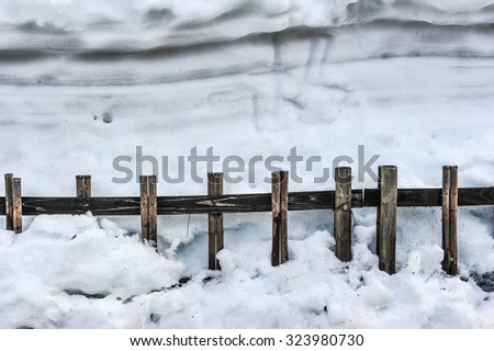 Wood fence covered with snow in Japan