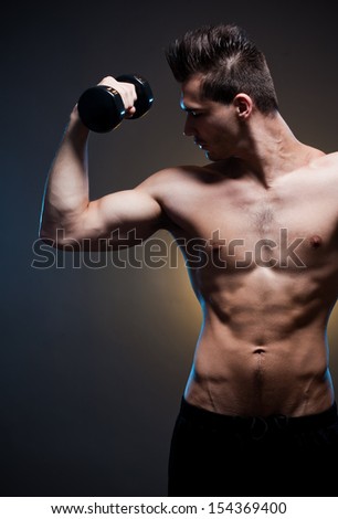 Portrait of a confident looking very lean fit young male athlete.