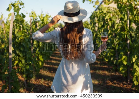 Similar – Image, Stock Photo Young woman enjoying wine near sea