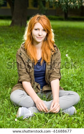 Beautiful redhead teen with dreamy romantic look.