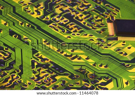 Backlit Circuit board with Chip and wiring that looks like a highway