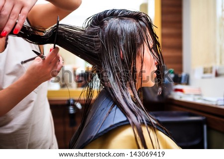 young woman at hairdresser