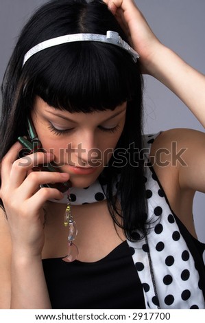 young black hair woman with cell phone