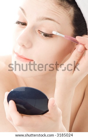 young woman grooming her self