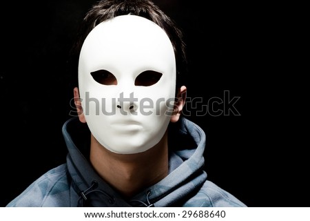 young man with white mask, studio shot