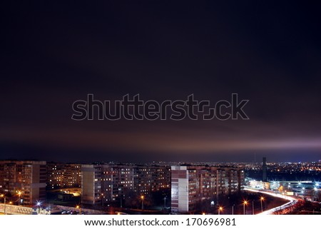 landscape of the night city with roads and streets the illuminated lamps
